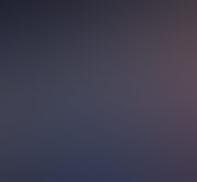 A blurry gray and black gradient that acts as a respectful placeholder.